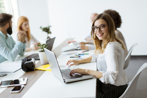 Business people discussing a strategy and working together in of
